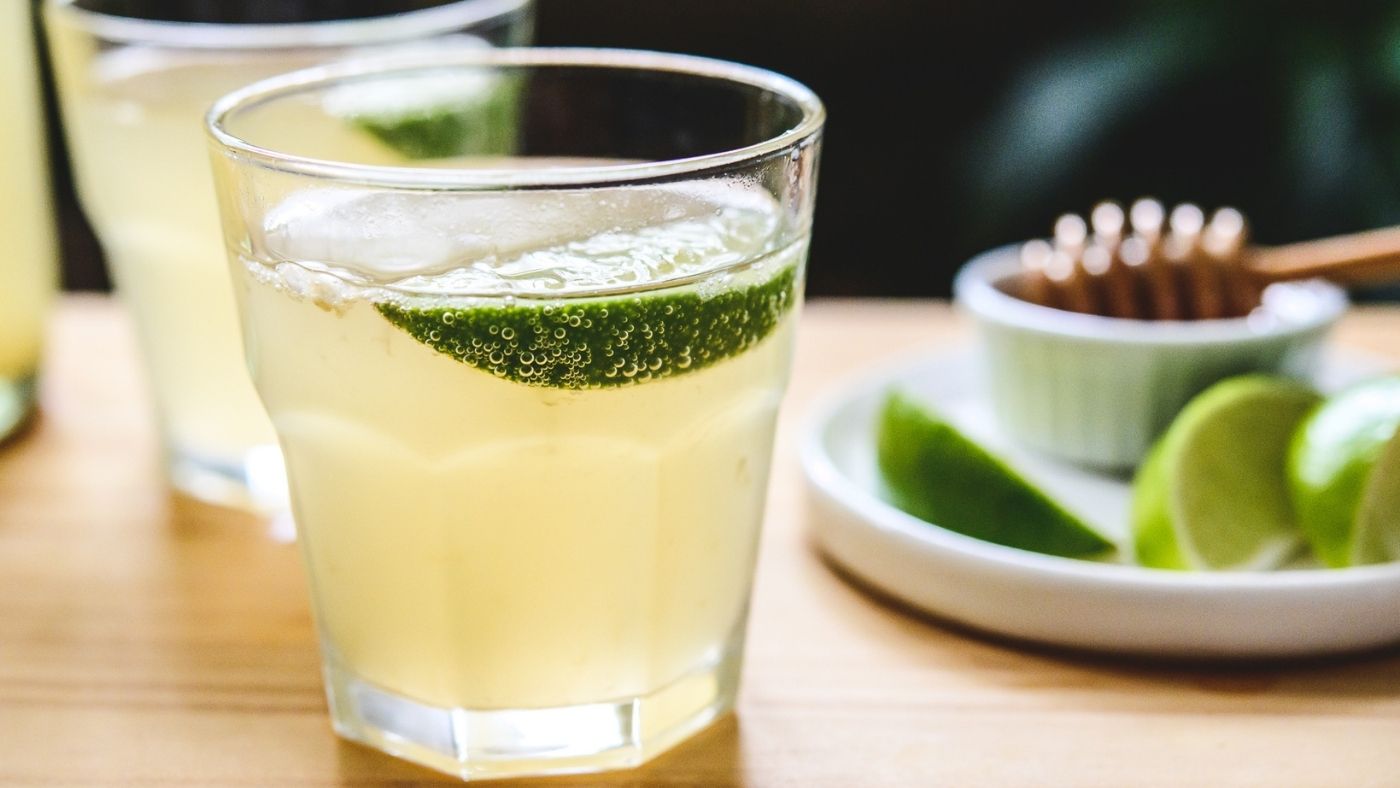 Glasses of honey, lime and green tea kombucha